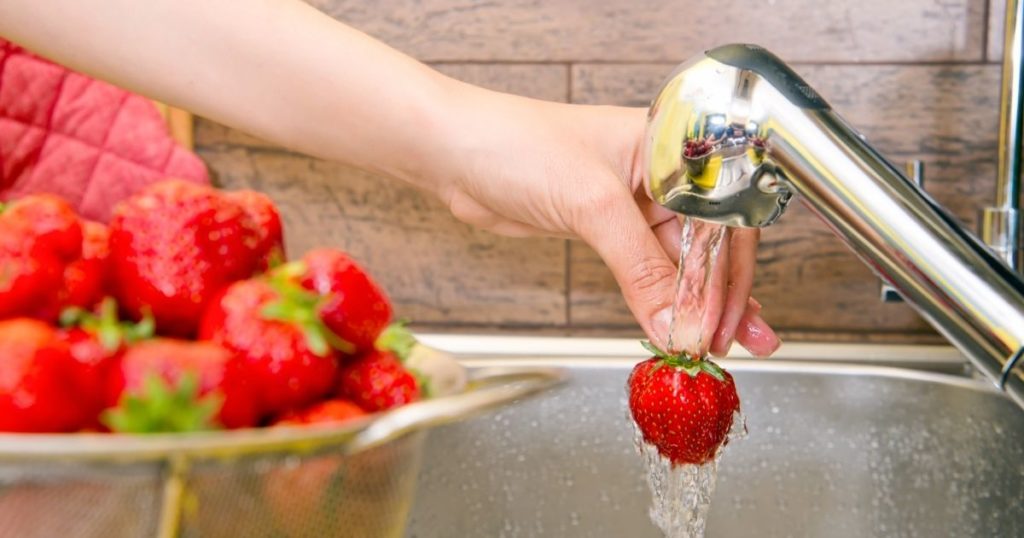 washing strawberries
